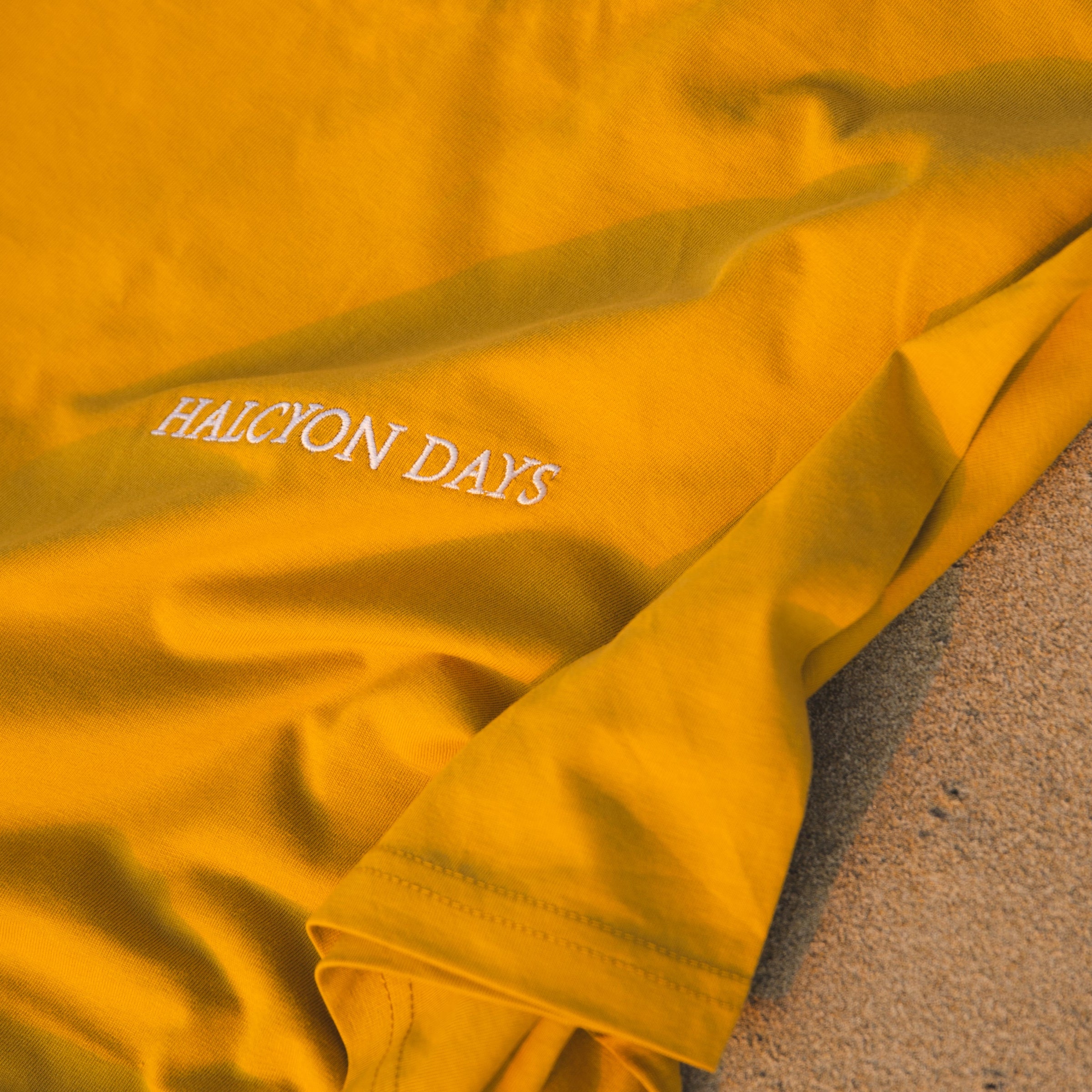 Halcyon Days Autumn Tee logo close up