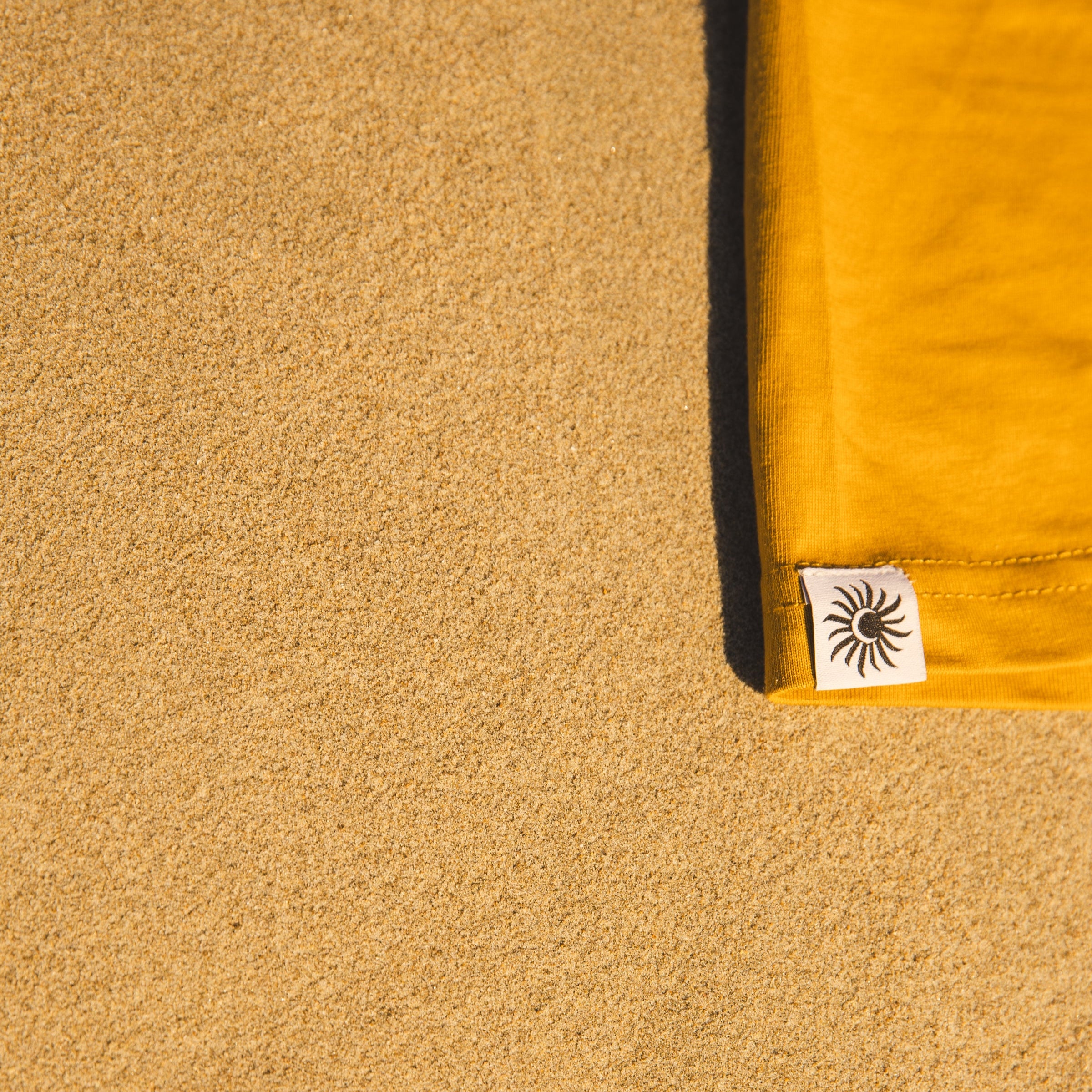 Halcyon Days Autumn Tee logo pip detail